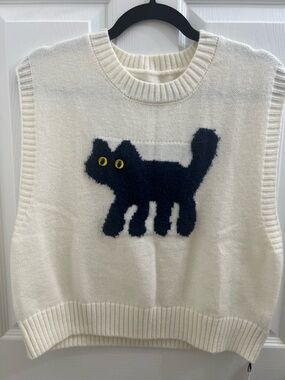 Cider Cream Knit Cat Appliqué Vest with Navy Fuzzy Cat and Yellow Eyes